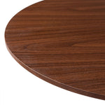 Close-up of a wooden table top with a white background