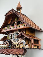 Traditional Musical Cuckoo Clock with Moving Woodchopper 18.5 Inch Height Cottage Design By River City Clocks
