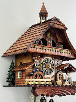 Musical Cottage Cuckoo Clock with Moving Figurines and Waterwheel 18.5 Inch Height By River City Clocks