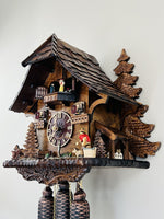 Cottage Mechanical Cuckoo Clock With 15 Inch Height And Fisherman Raising Pole By River City Clocks