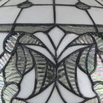 White-on-White Glass Design: A consistently elegant shade that blends into varied palettes while softly reflecting light