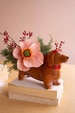 Festive ceramic dachshund planter for small plants and Christmas decor