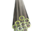 Metallic tube with green circular inserts on a white background