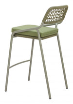 Bar stool with green cushion and woven backrest on a white background