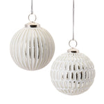 Christmas tree ornaments in frosted white and silver