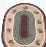 Eco-Friendly Lodge Rug – Braided Jute Oval with Pinecone Design