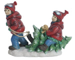 kids with tree figurine