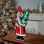 Illuminated Santa Holding Tree