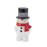 Festive snowman decor with scarves and hats