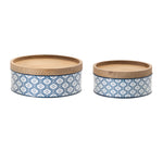 Blue patterned metal kitchen canisters with wood lids