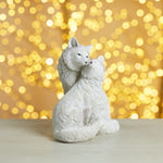 white holiday figurine