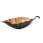 Black and gold leaf platters styled as table centerpieces