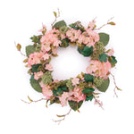 Decorative pink floral wreath for entryway wall styling