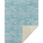 Patterned blue rug with a beige border on a white background