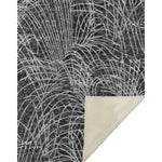 Rug with abstract leaf pattern on a white background