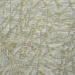 Textured fabric pattern with a mix of gray and beige colors