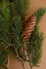 Lifelike fir greenery stem for seasonal arrangements