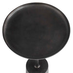 Black round object on a white background