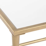 Gold metal frame corner detail on a white background