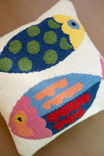 Hand-hooked pillow with two fish design