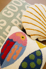 Two fish hooked decorative pillow front view