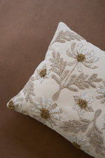 Embroidered ivory lumbar cushion for home décor