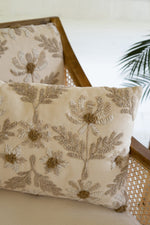 Ivory accent pillow with subtle embroidered details