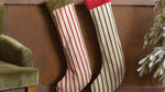 Oversized red and cream Christmas stockings with velvet trim
