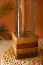 Wooden block with a metallic base on a textured surface