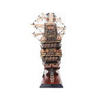 Model of a ship on a white background