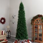 Tall artificial Christmas tree in a living room setting with decorations.