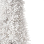 Close-up of a white artificial Christmas tree on a white background