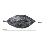 Decorative leaf-shaped object with measurements on a white background