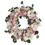 Floral wreath with pink and white flowers on a white background