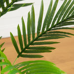 Green faux areca palm with full feathery fronds for indoor décor