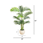 Artificial tropical palm in a white round planter for office décor