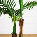 UV-resistant artificial tropical palm tree for patio and porch decoration.