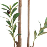 Artificial olive branch faux foliage with green leaves, a dark olive pit, and faux bamboo stalks on a white background.