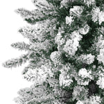 Frosted artificial Christmas tree with pinecones on a white background