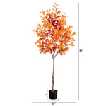 Artificial tree with orange leaves on a white background