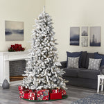 Frosted Christmas tree with presents in a living room setting