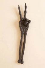 Brown cast iron skeleton arm Halloween accent