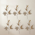 Metallic gold eucalyptus stem for holiday arrangements