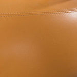 Benzara Round Leather Upholstered Accent Chair with Curved Open Back, Yellow