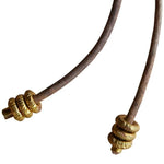 Benzara BM229272 Square Shape Pearl Accent Bolo Tie with Leather Cord, Brass