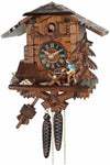 Hand-carved Black Forest cuckoo clock with man sawing wood at the top of every hour