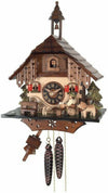 Cottage cuckoo clock with beer drinker raising mug and carved trees