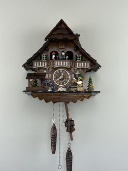 Musical Black Forest Cuckoo Clock 13-Inch with Animated Dancers, Waterwheel, Beer Drinker & Chalet Details by River City Clocks