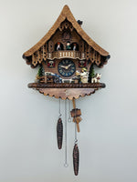 Quartz Cuckoo Clock – Cottage Design – 13-inch Height with Beer Drinker and Waterwheel – By River City Clocks
