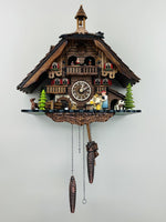 13-Inch Musical Chalet Cuckoo Clock with Noodle Bruiser, Waterwheel and Dancers – 12 Melodies by River City Clocks